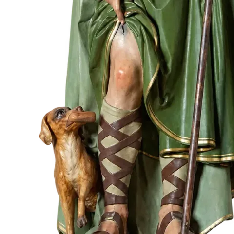 St Roch’s dog at his side, the saint lifting his robe to show the plague sore on his leg: detail of a Simon Art Co. statue