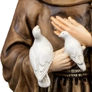 St Francis of Assisi holding two white doves: detail of a Simon Art Co. statue