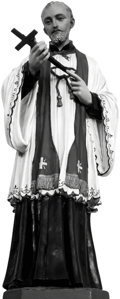 St Francis Xavier statue gazing at the cross held in both hands, in a white surplice with an embroidered edge and a dark stole