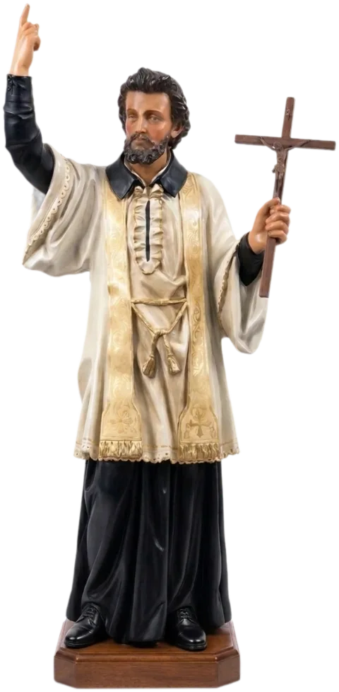 St Francis Xavier statue pointing to heaven and holding a crucifix, in a cream surplice and gold stole over a black cassock, natural finish